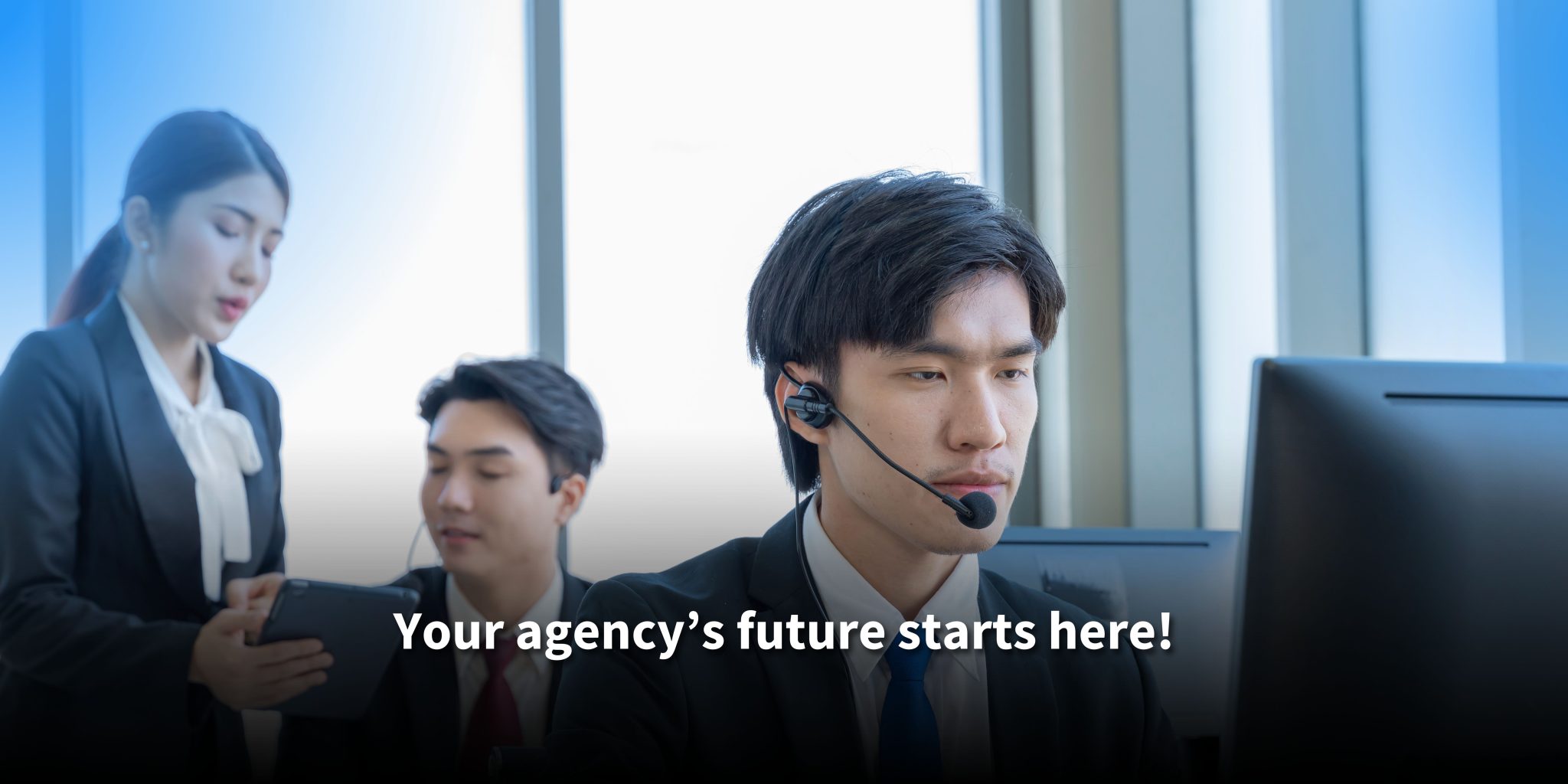 Three call center agents in a modern office setting, with a focused male agent wearing a headset at the forefront. Text reads: 'Your agency’s future starts here!