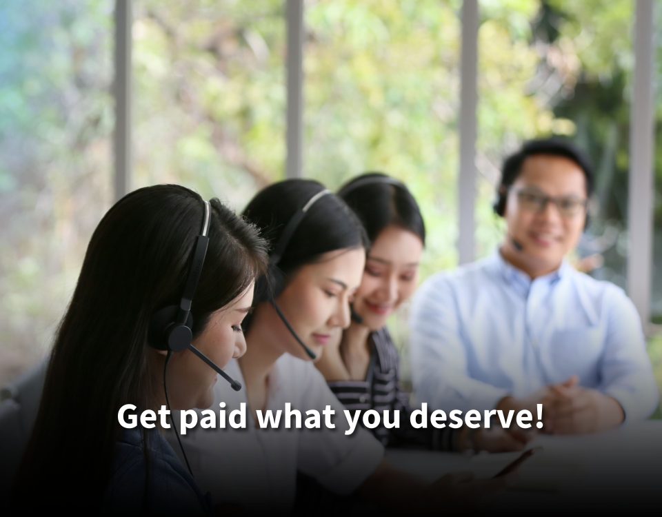 Four smiling call center agents with headsets in a professional office, collaborating at their computers. Text reads: 'Get paid what you deserve!