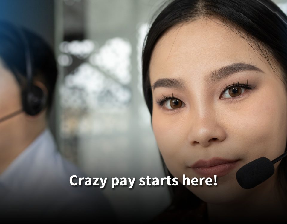 A confident female call center agent wearing a headset, with a male colleague blurred in the background. Text reads: 'Crazy pay starts here!