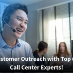 A smiling male call center agent wearing a headset sits in a modern office, while two other colleagues confer in the background. Text on the image reads, “Master Customer Outreach with Top Outbound Call Center Experts!