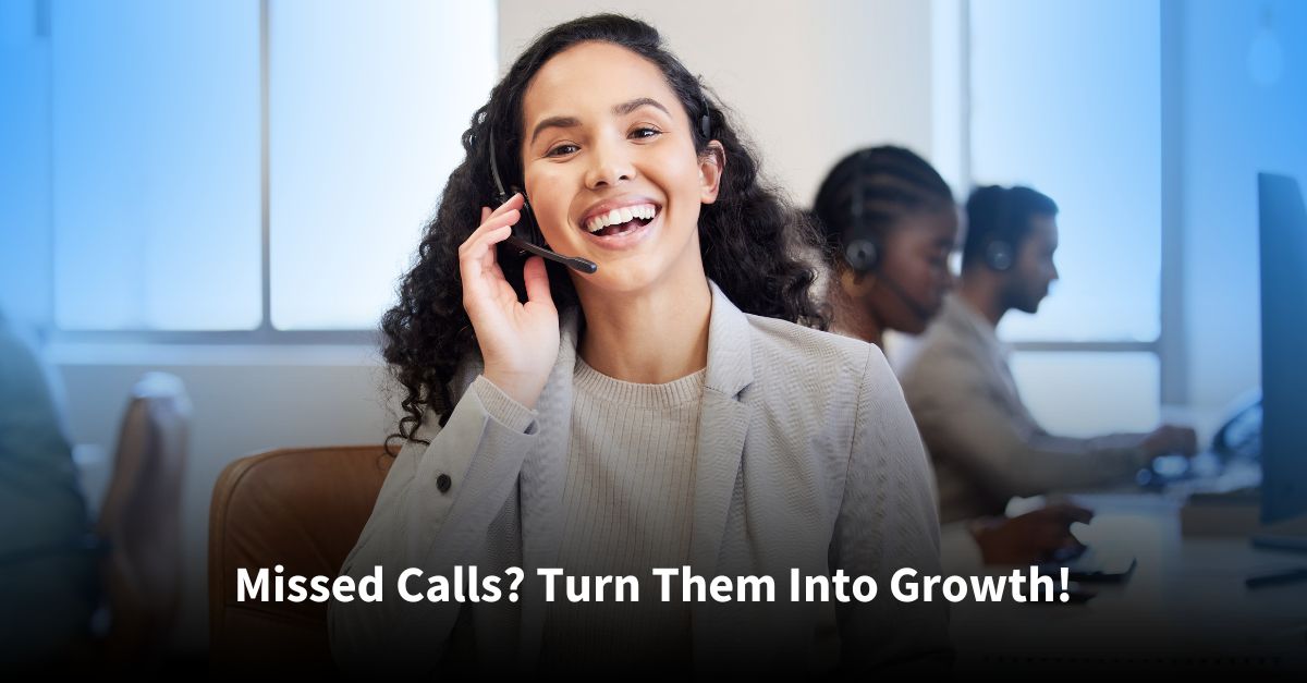 Smiling customer service representative with a headset assisting a caller in a professional office environment, with colleagues working in the background.