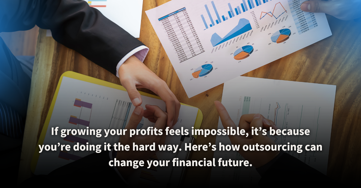 Business professionals analyzing colorful financial charts and graphs on a wooden table, symbolizing collaborative financial planning. Outsourcing financial planning helps optimize strategies, minimize risks, and maximize profits for sustainable growth.