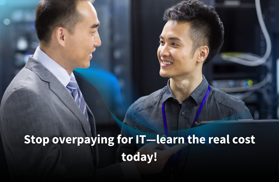 Two IT professionals discussing in a server room, with one holding a laptop and smiling. Text overlay reads: 'Stop overpaying for IT—learn the real cost today!